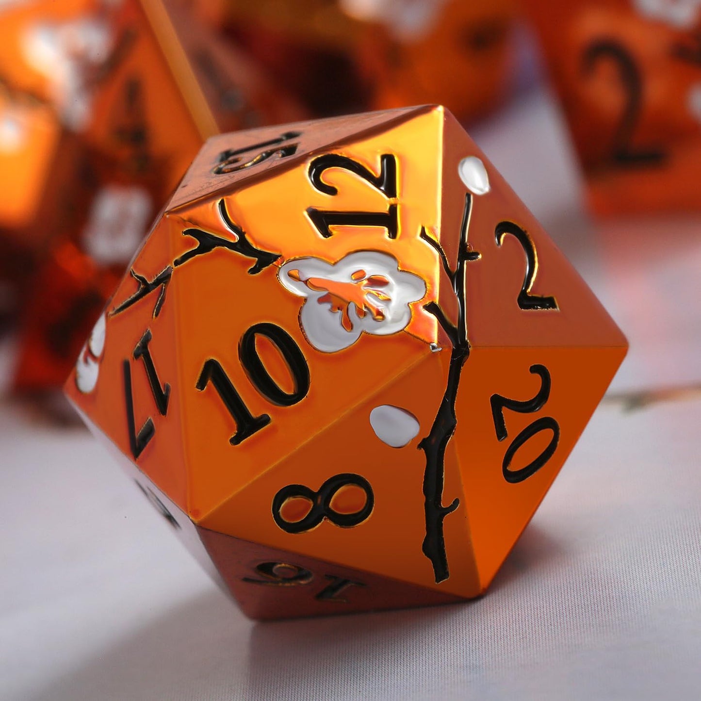 Orange Metal Dice D&D, DNDND 7 PCS Heavy Metallic DND Dice Set with Gorgeous Gift Case for Dungeons and Dragon Tabletop Game (Orange with White Flowers)