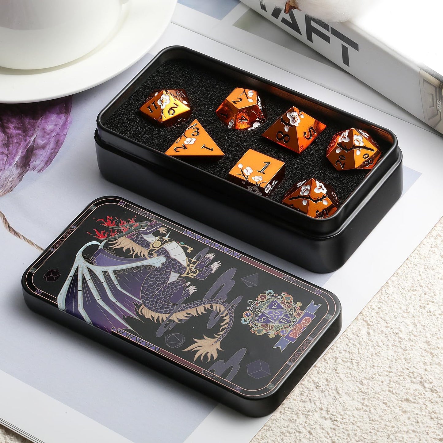 Orange Metal Dice D&D, DNDND 7 PCS Heavy Metallic DND Dice Set with Gorgeous Gift Case for Dungeons and Dragon Tabletop Game (Orange with White Flowers)